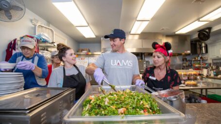 Food service staff cooking